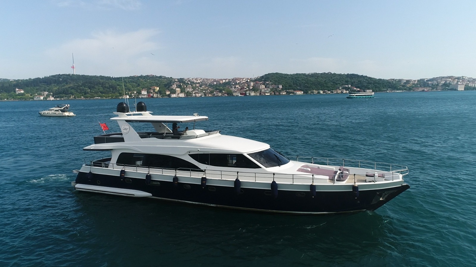 Private yacht boat on the Bosphorus and shores of the Istanbul