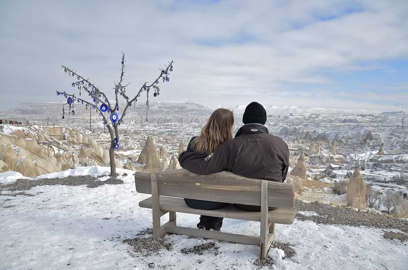 couple in honeymoon in cappadocia winter